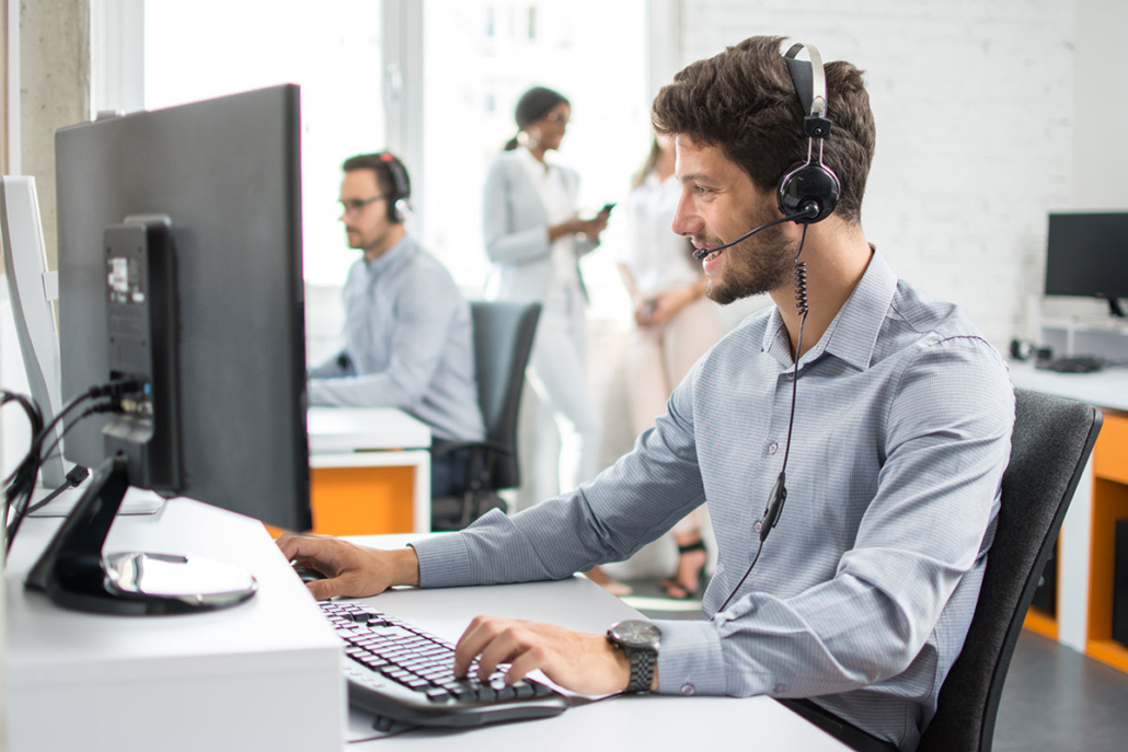 A Happy Technical Support Representative Engaging a Client Virtually